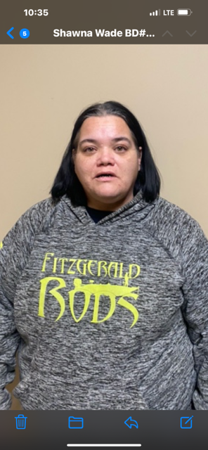 Person wearing gray 'Fitzgerald Rods' sweatshirt.