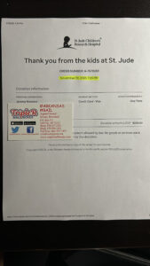 St. Jude donation receipt and bail bonds card.